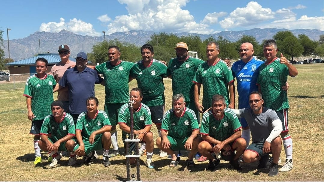 GLC team posing with their championship trophy